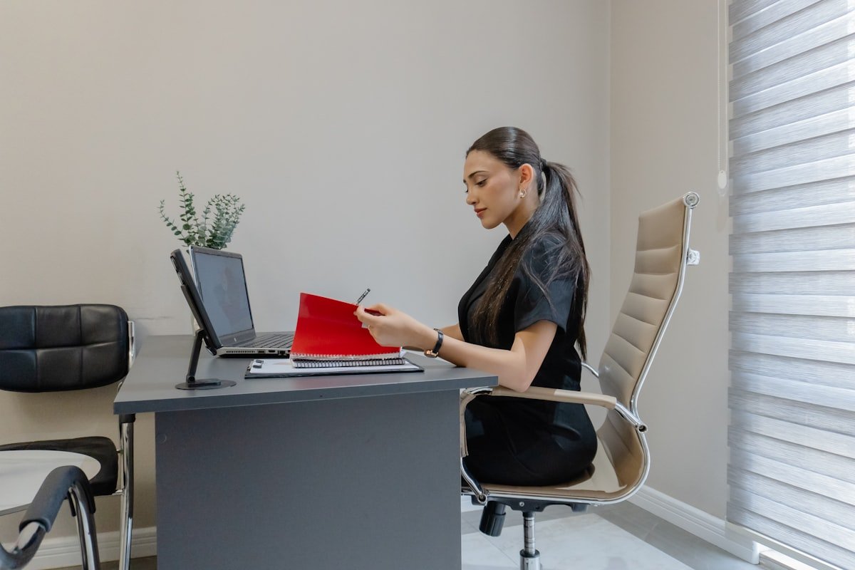 Person working alone at a desk in a UK office environment